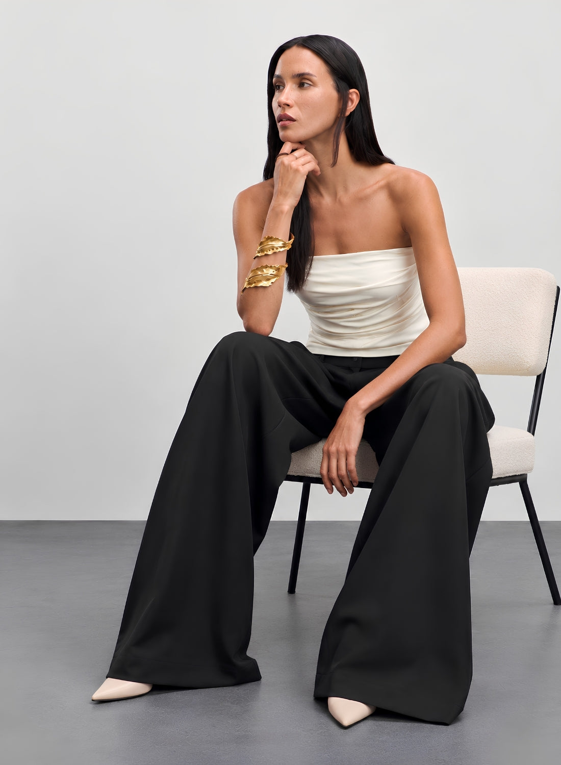 Black pleated wide leg trousers