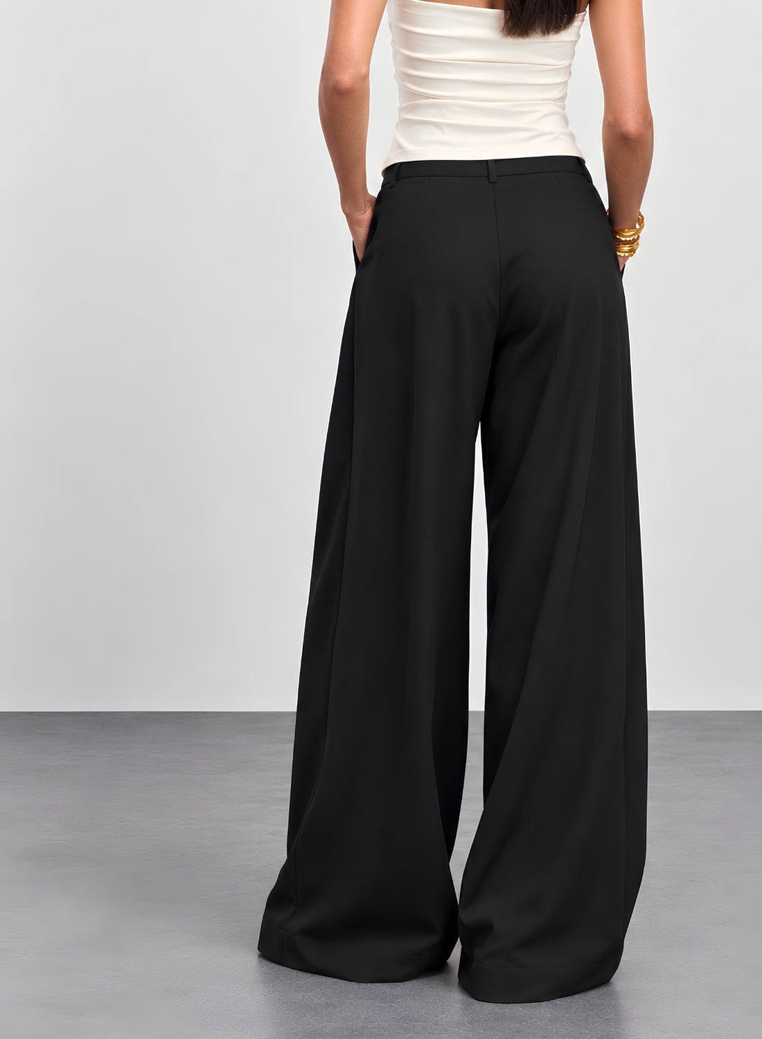 Black pleated wide leg trousers