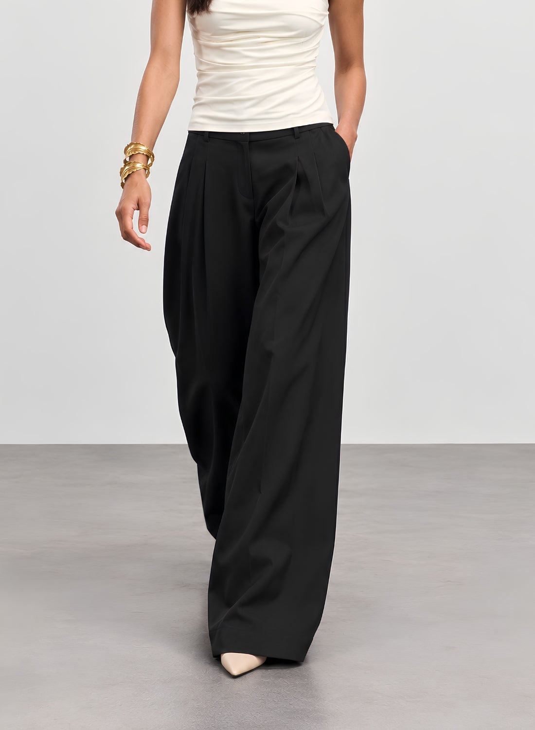 Black pleated wide leg trousers