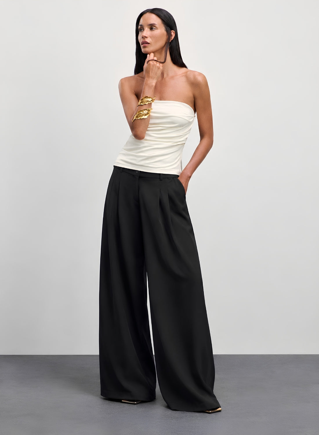 Black pleated wide leg trousers