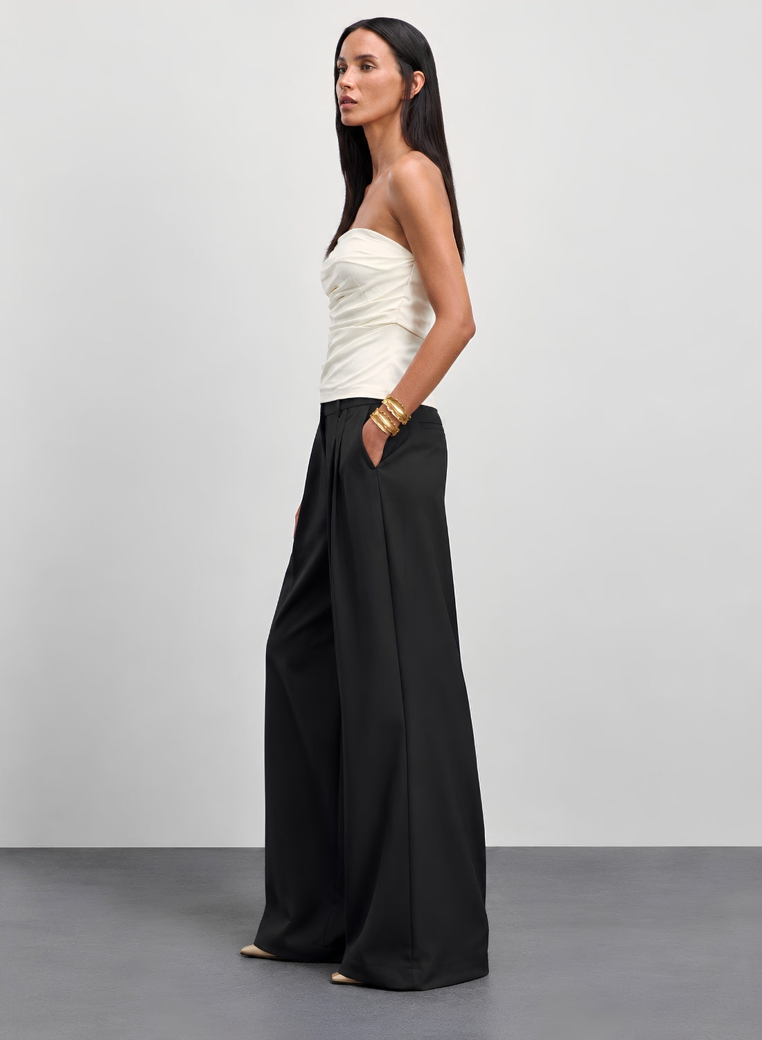Black pleated wide leg trousers